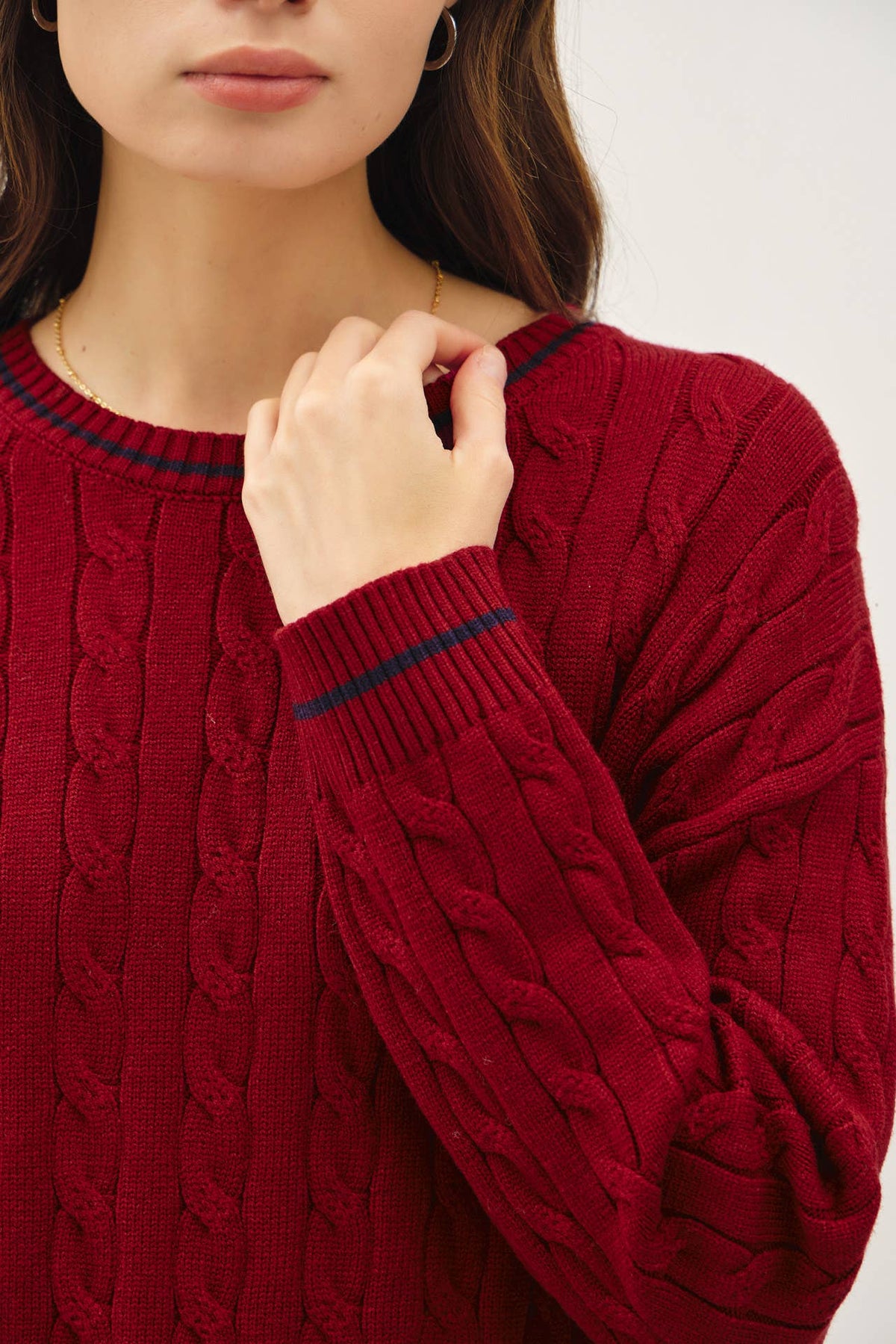CHUNKY CABLE KNIT SWEATER WITH ACCENT DETAIL