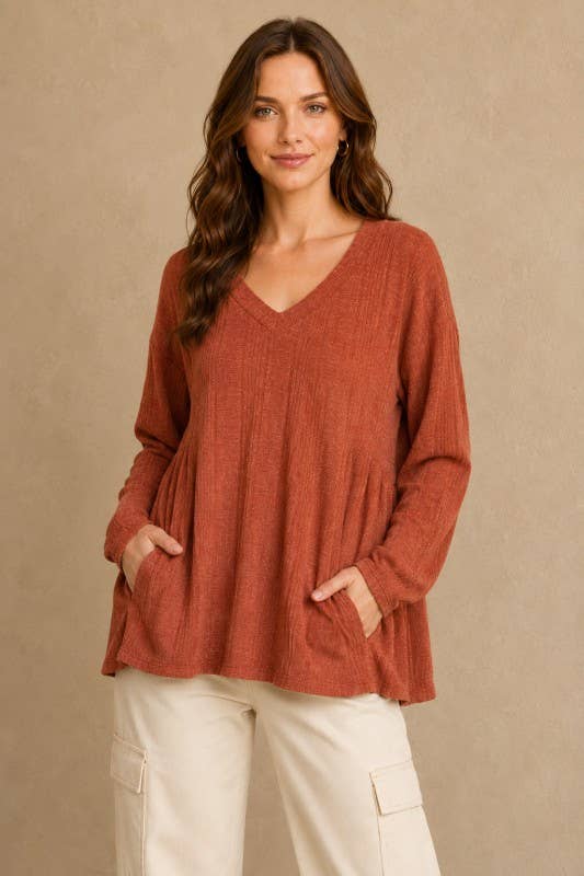 Plus size Rib knit long sleeve top with side yoke.