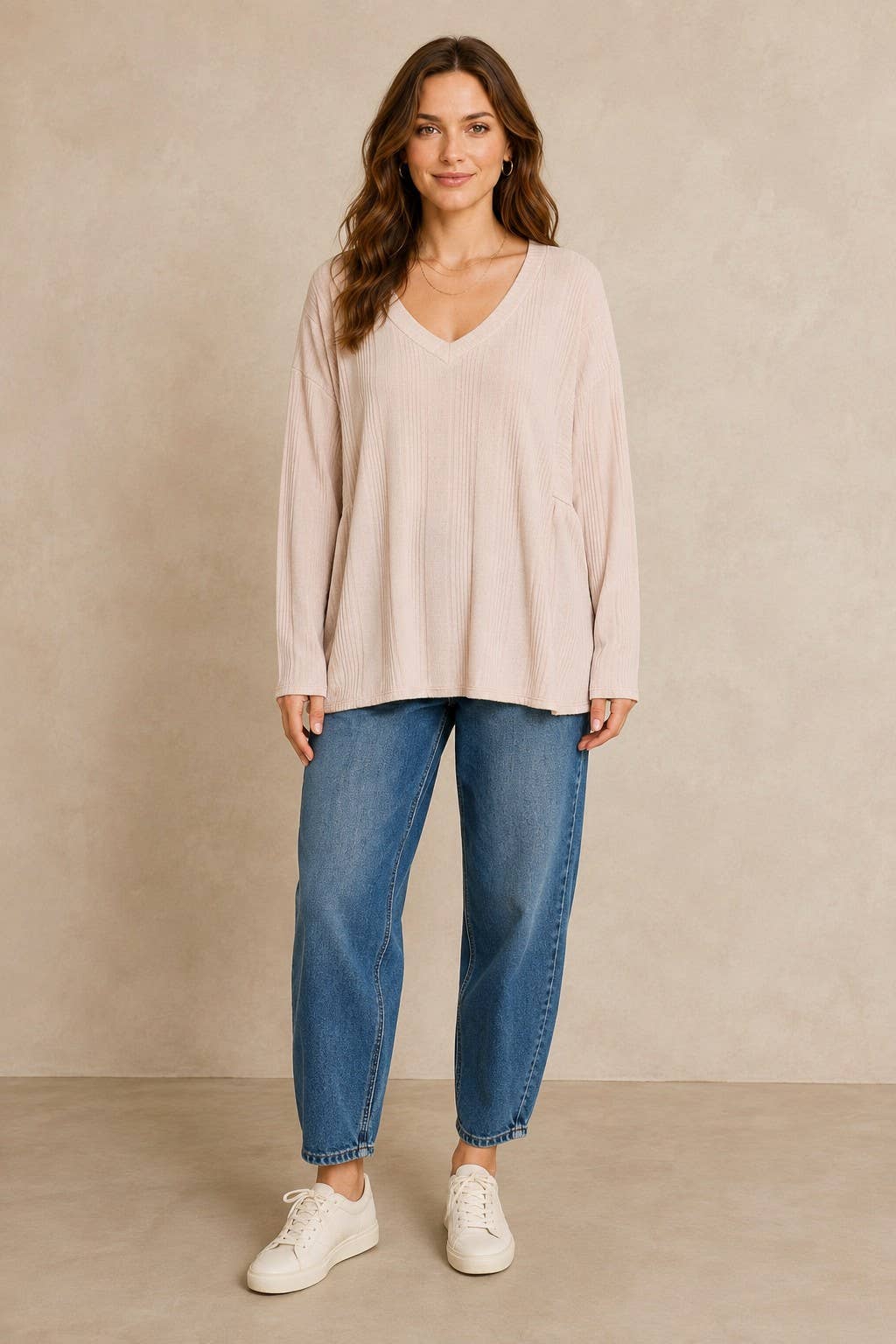Plus size Rib knit long sleeve top with side yoke.