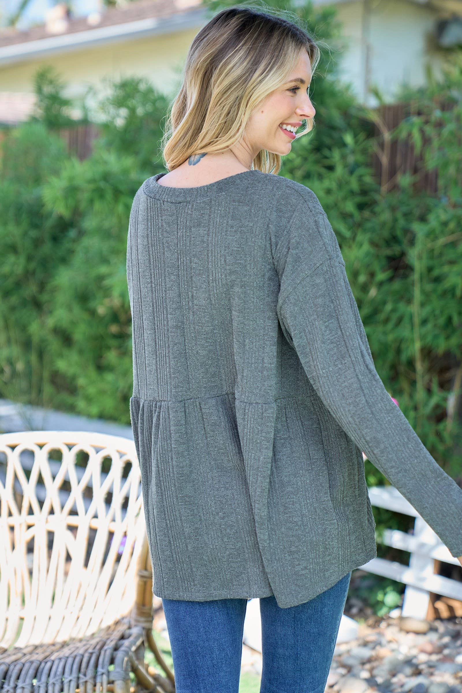 Plus size Rib knit long sleeve top with side yoke.