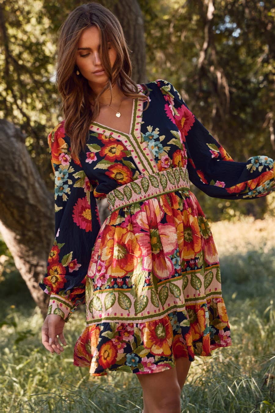 Women’s boho floral mini dress with long puff sleeves and smocked waist