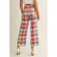 Thumbnail for Multicolored checkered pants worn by a person on a plain background
